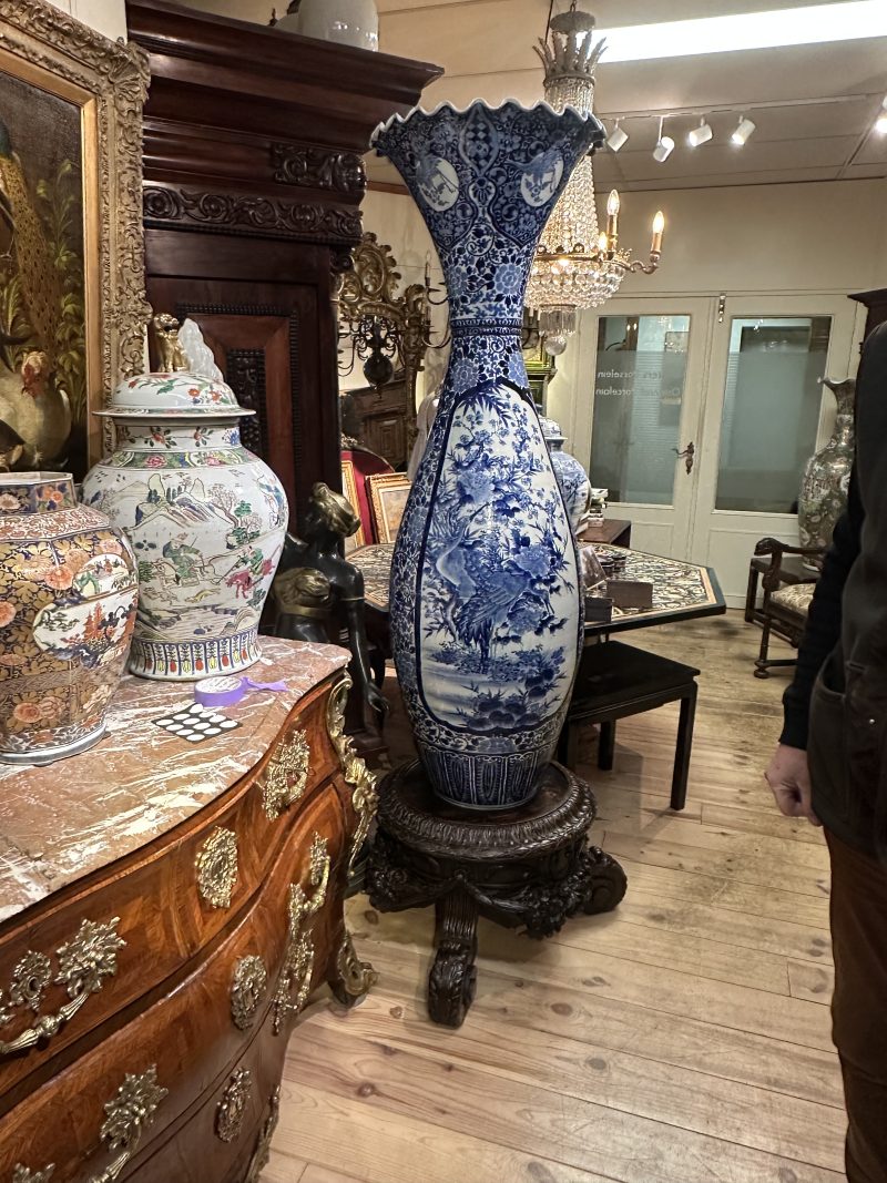 Large japanese vase on carved wood stand, 19th century